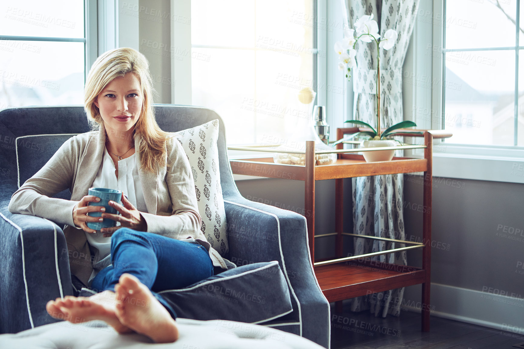 Buy stock photo Portrait, drinking coffee and woman relax in home living room for morning, latte or espresso for energy in lounge. Tea, girl and person on sofa for peace, calm or enjoy beverage on couch in apartment