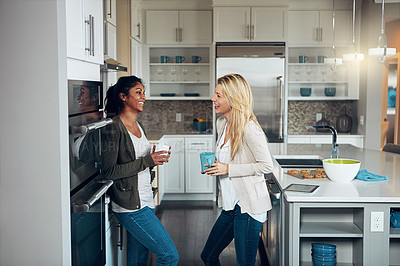 Buy stock photo Coffee, morning and women friends in kitchen of apartment together for bonding or break. Beverage, conversation and funny with happy roommate people laughing in home for comedy, humor or joking