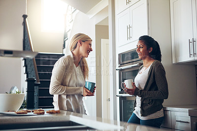 Buy stock photo Coffee, conversation and smile with friends in kitchen of apartment together for bonding. Diversity, funny and morning with happy roommate people in laughing apartment for comedy, humor or joking