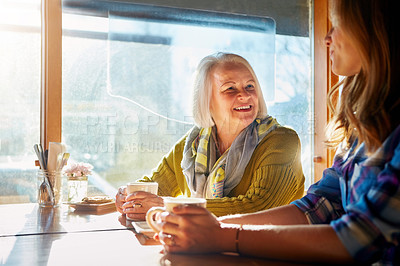 Buy stock photo Senior woman, smile and conversation in cafe with daughter for memories or bonding with relax. Coffee shop, restaurant and people with discussion, laugh and family with happiness or love on weekend.