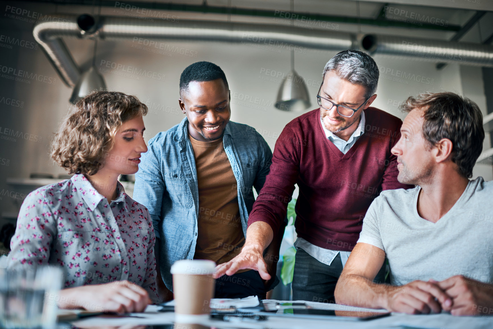 Buy stock photo Shot of a creative business team having a meeting and discussing business related issues in the office