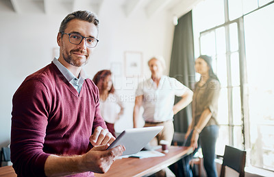 Buy stock photo Portrait, man on tablet and web design meeting with team in creative office workspace and planning, research and management. Businessman, happy teamwork and leader working with technology for project