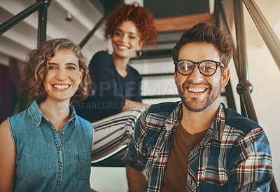 Buy stock photo Shot of creative employees on the staircase at work