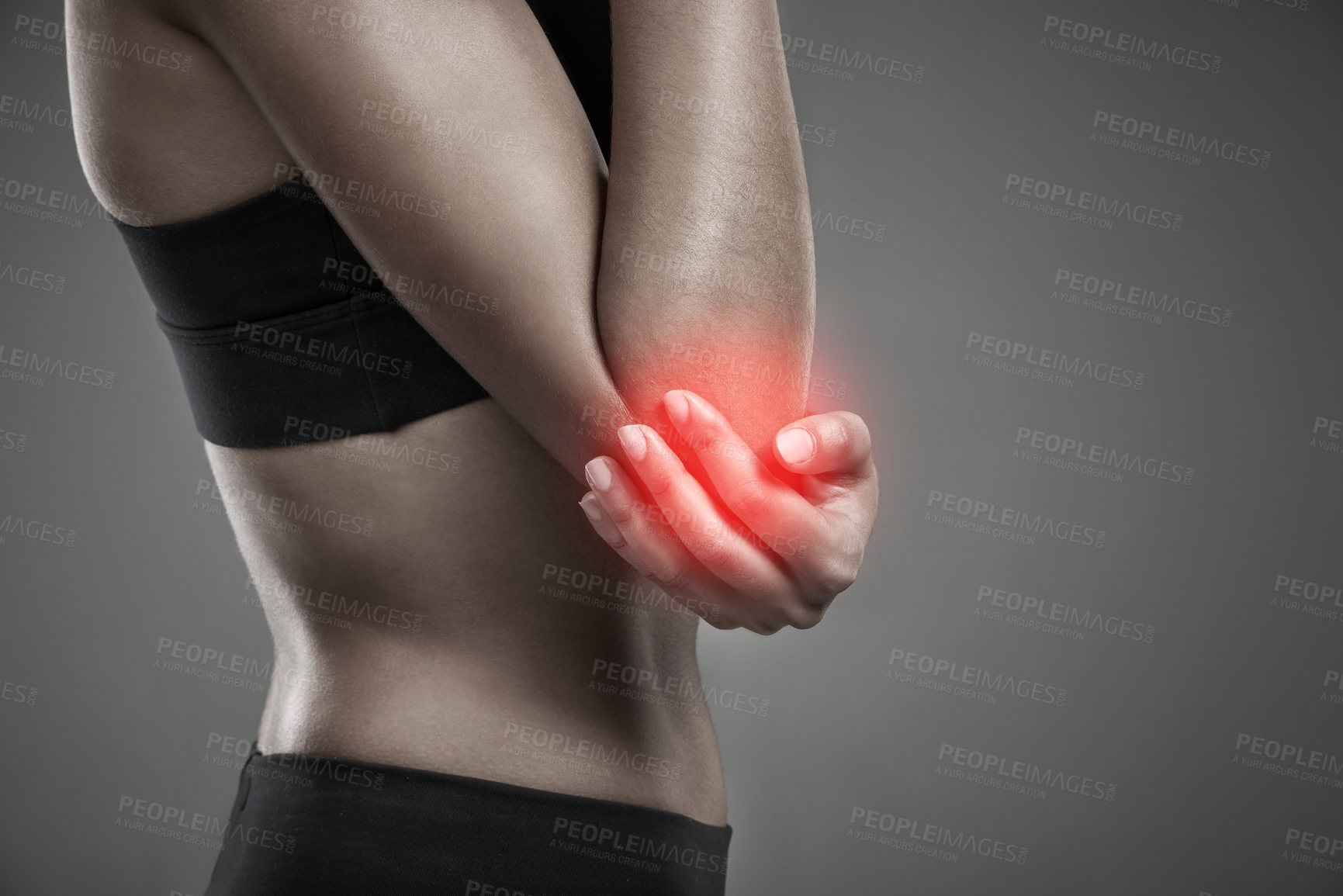 Buy stock photo Woman, elbow pain and athlete for injury in studio, training accident and red glow on gray background. Female person, mockup space and joint arthritis or fibromyalgia, arm and inflammation strain