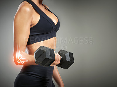 Buy stock photo Woman, training and red glow in weightlifting with dumbbell, injury and workout in studio background. Female person, exercise and wellness for sport, weightloss and fitness as bodybuilder for muscle