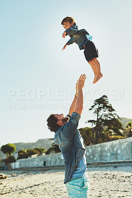 Buy stock photo Throw, dad or child at beach for playing, holiday or travel, support in Portugal with boy, toddler or family. Parent, father or kid at sea for vacation with fun adventure, wellness or nature to relax