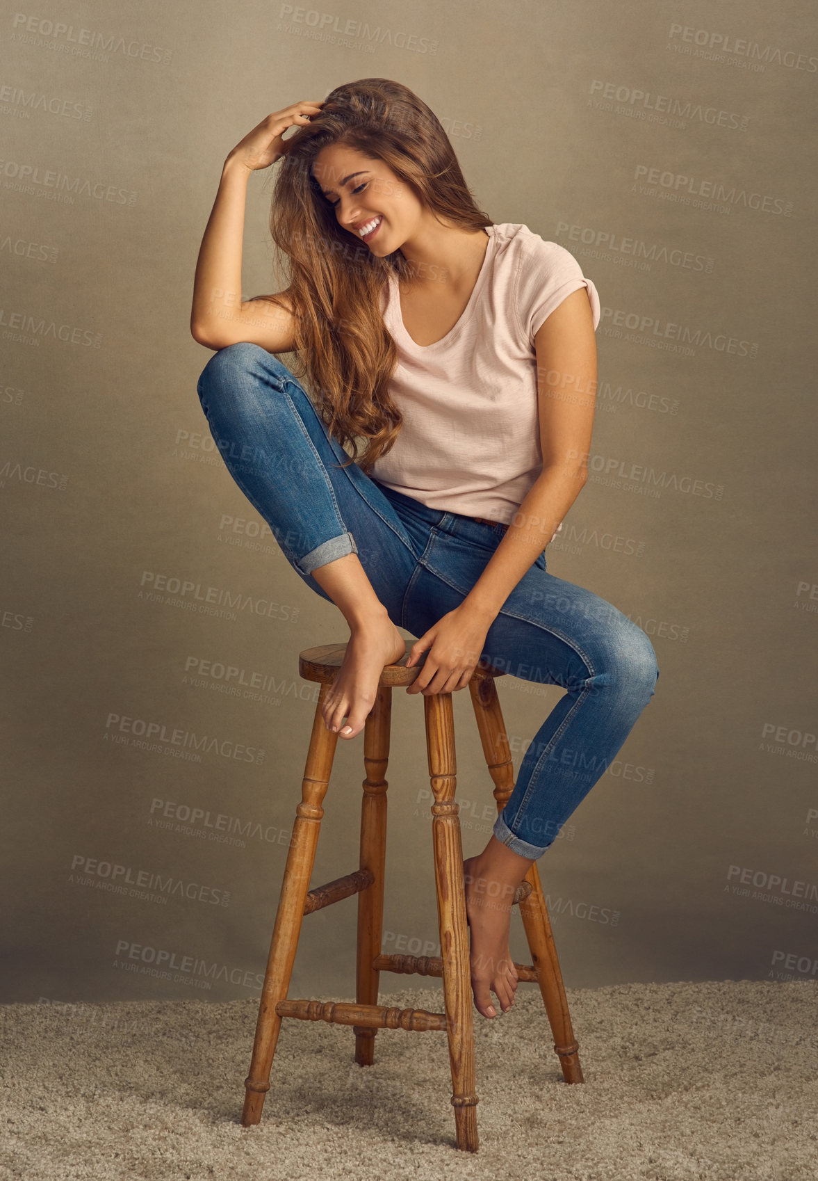 Buy stock photo Woman, fashion and chair with smile in studio on brown background with style and swag. Female person, happy and hair with clothes or street wear, outfit and satisfied with gen z trends in confidence