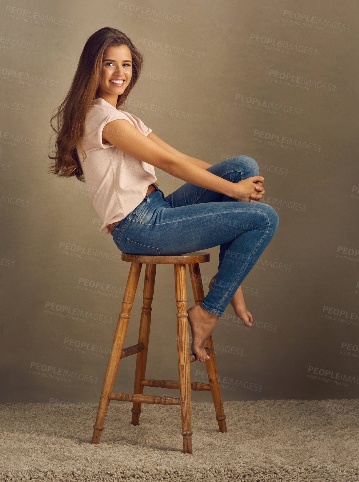 Buy stock photo Woman, fashion and chair with happiness in studio on brown background with style and swag. Female person, smile and portrait for clothes or street wear, outfit and confident with gen z trends