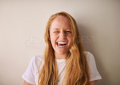 Buy stock photo Shot of a young woman being silly at home