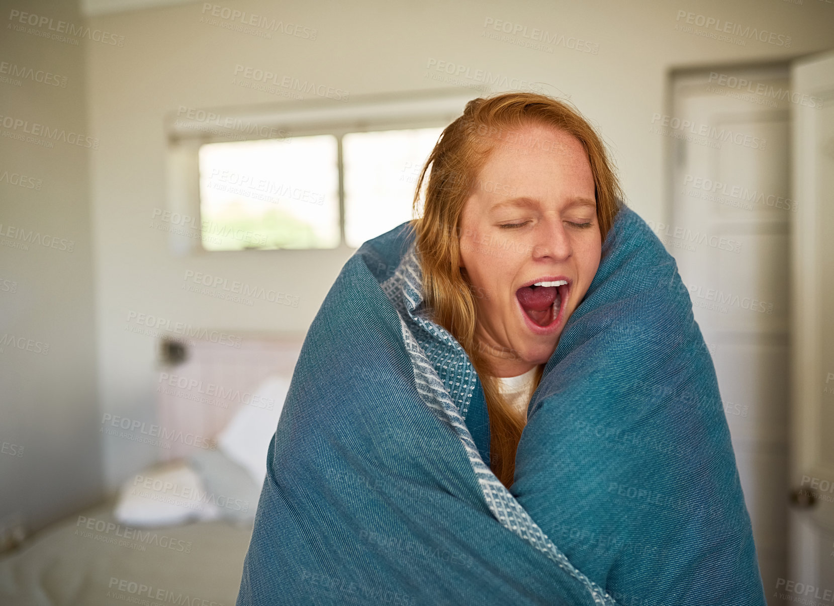 Buy stock photo Woman, blanket and tired in morning with yawn for burnout, warm and sleeping problem in home. Female person, wake up and open mouth in bedroom for fatigue with duvet, insomnia and relax in Ireland