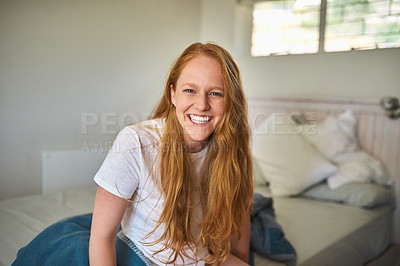 Buy stock photo Shot of a young woman at home