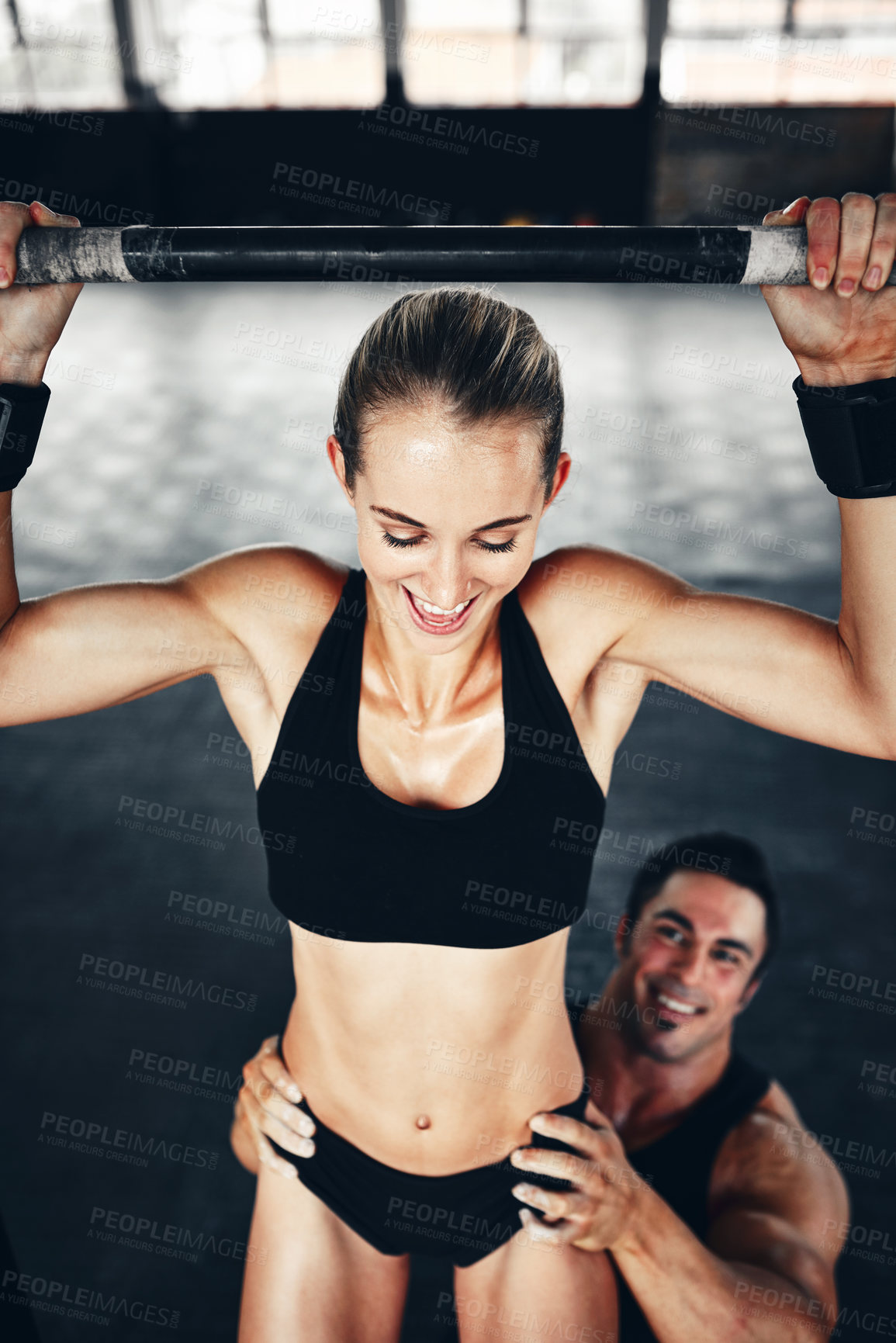 Buy stock photo Shot of a couple working out at the gym