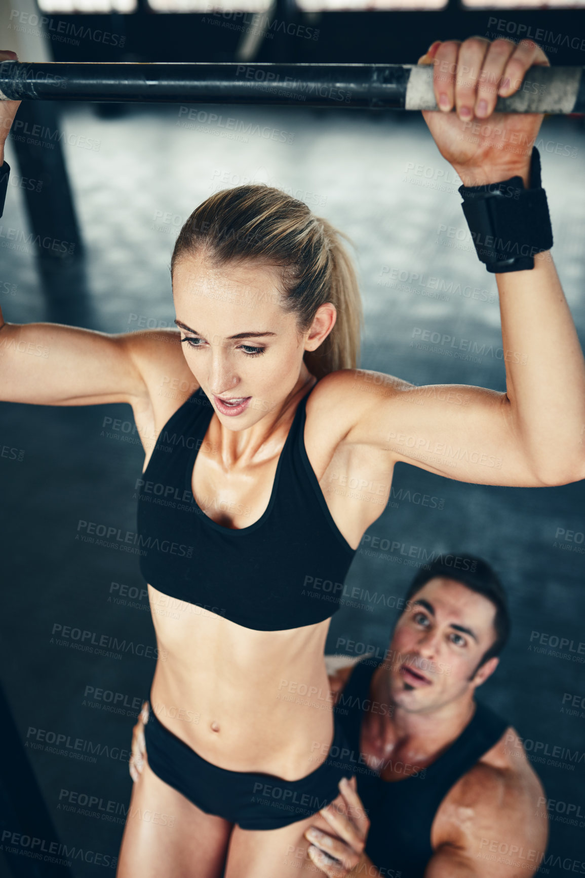 Buy stock photo Shot of a couple working out at the gym