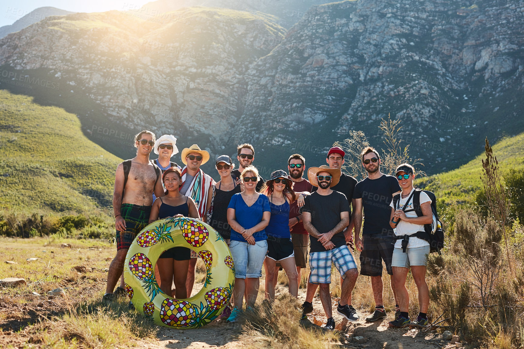 Buy stock photo Portrait, group and smile in trip, mountain and hiking in nature with sunglasses, summer or holiday. Outdoor, tourist and people with tour guide in Argentina, vision and friends in vacation or travel