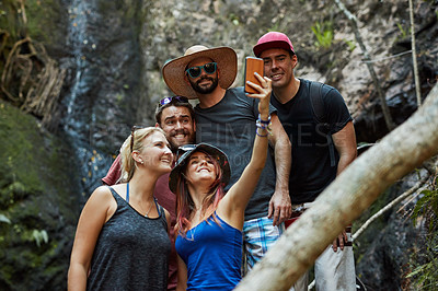 Buy stock photo Shot of young people spending the day outside