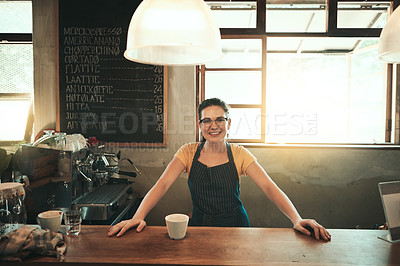 Buy stock photo Portrait of a young barista working in her coffee shop