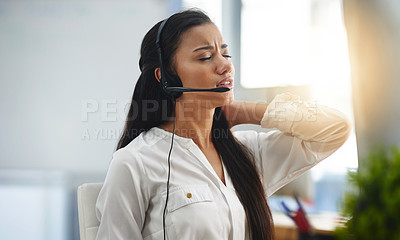 Buy stock photo Stress, burnout or woman in call center with back pain injury while working in telecom help desk office. Consultant, injured agent or tired sales girl with joint pain emergency, fatigue or accident