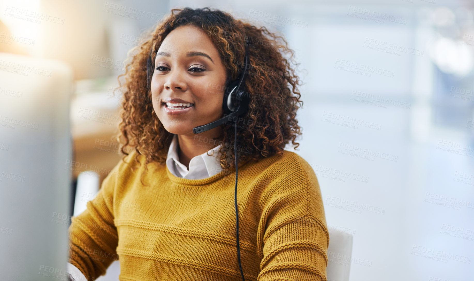 Buy stock photo Shot of a female agent working in a call centre