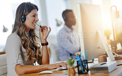 Buy stock photo Shot of a female agent working in a call centre