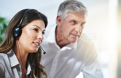 Buy stock photo Coaching, woman or senior manager in call center training telemarketing in customer services office. Contact us, coaching or mature mentor teaching an insurance agent on new job advice on computer