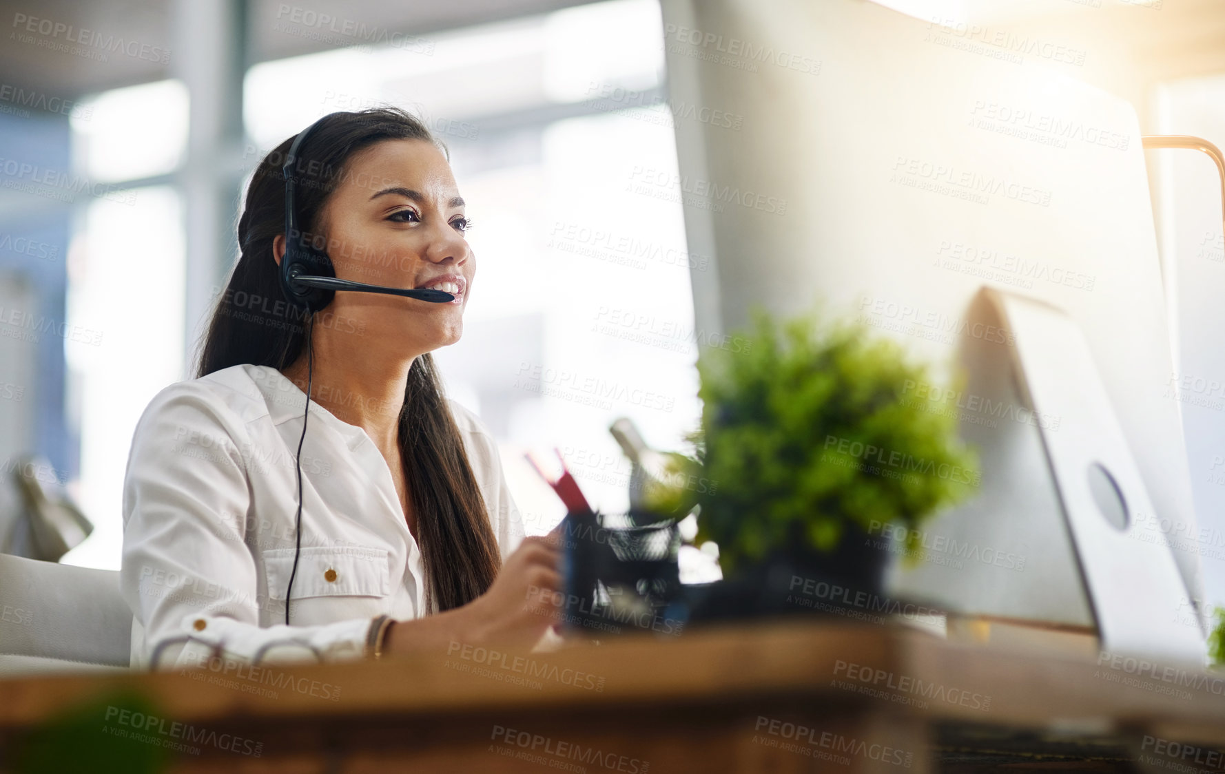 Buy stock photo Communication, customer services or woman in call center consulting, speaking or talking at help desk. Virtual assistant, friendly or sales consultant in telemarketing or telecom company office 