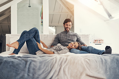 Buy stock photo Shot of an attractive young couple spending quality time at home