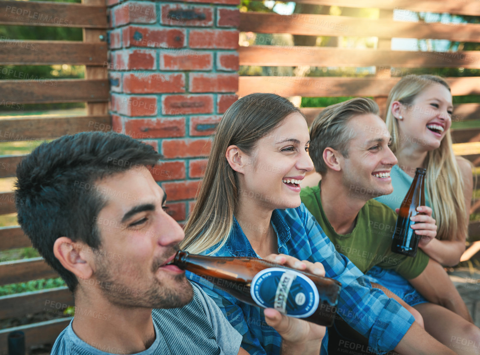 Buy stock photo Friends, beer and outdoor of home on patio with smile, laugh and labor day fun at party. Summer, backyard and happy people with alcohol, conversation and joke at group reunion and social event