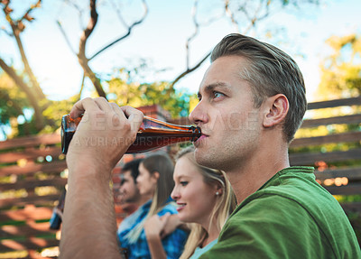 Buy stock photo Man, beer and friends outdoor of home on patio with drinks, bottle and labor day fun at party. Summer, backyard and together with alcohol, conversation and joke at group reunion and social event