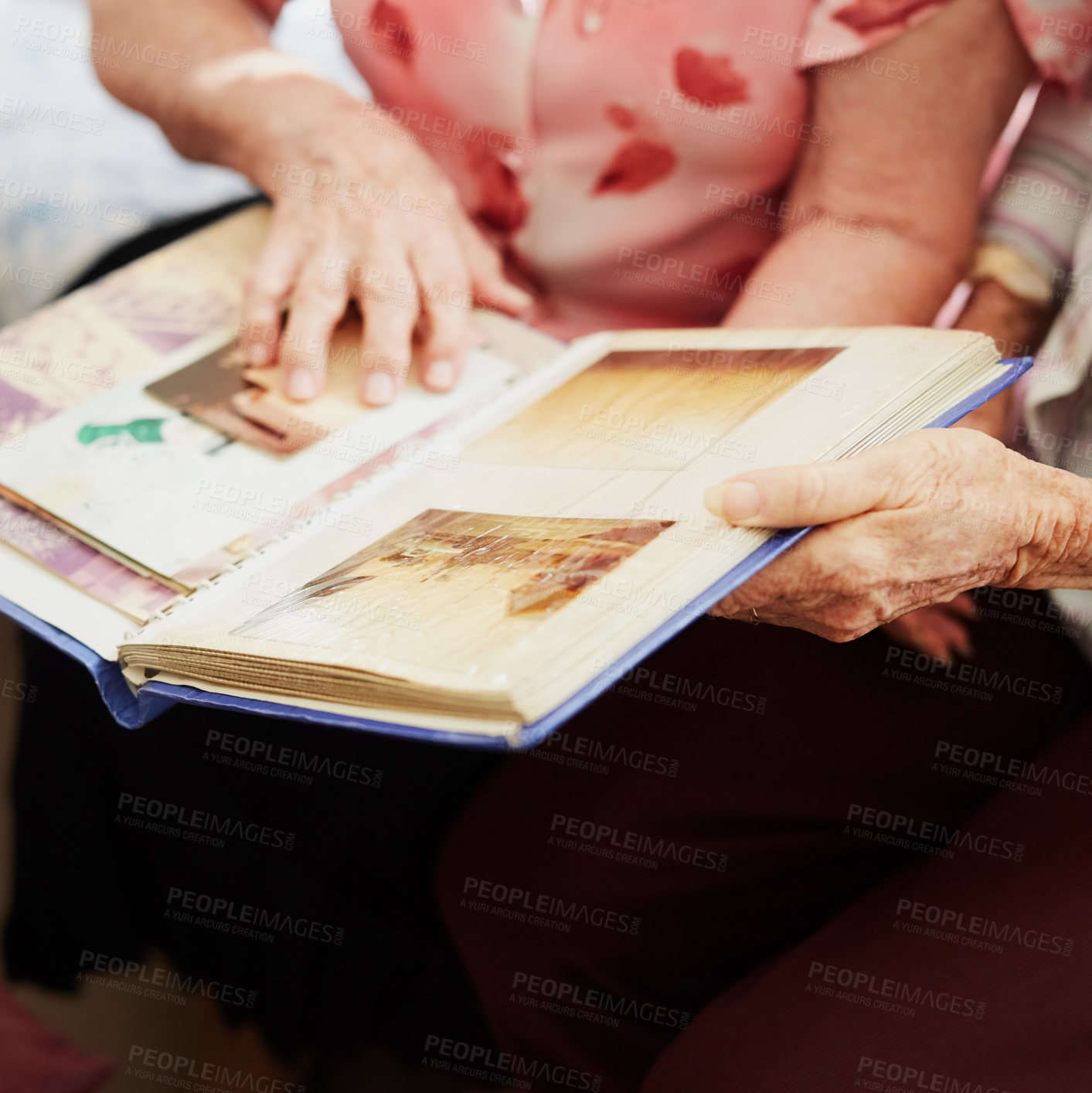 Buy stock photo Photo album, hands and senior women in house for memory, remember or nostalgia for history. Picture book, friends and elderly female people reminiscing together with conversation in retirement home.