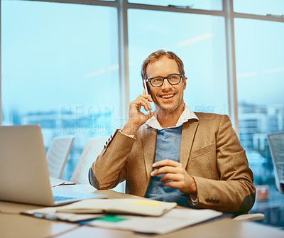 Buy stock photo Cropped shot of a handsome male designer working at his desk in the office