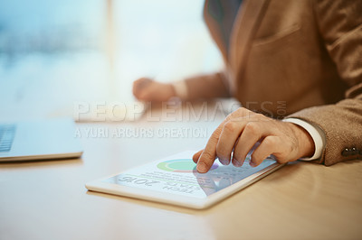 Buy stock photo High angle shot of an unrecognizable male designer working at his desk in the office