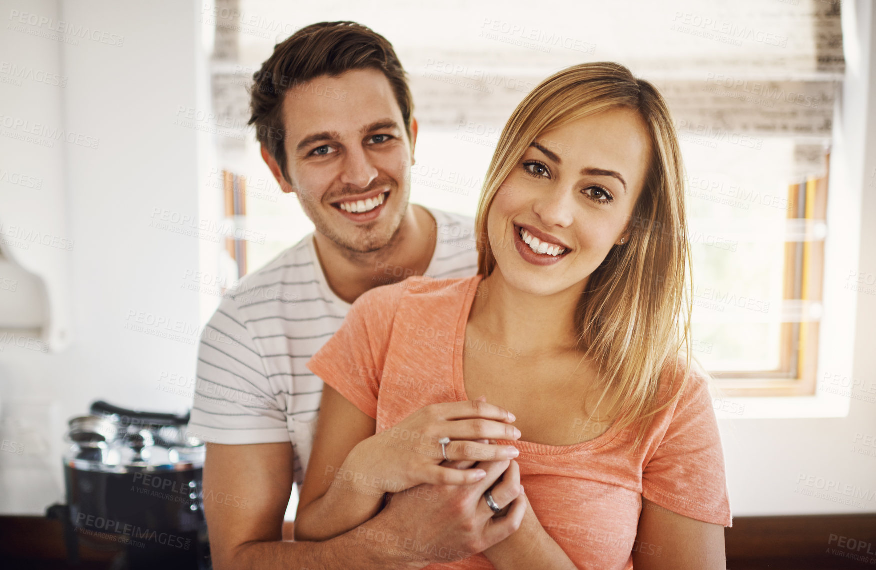 Buy stock photo Portrait of a happy young couple spending time together in the morning at home