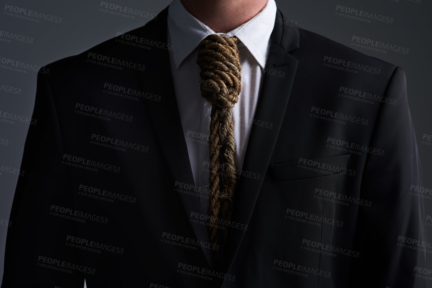 Buy stock photo Businessman, rope and noose tie with corporate stress, finance debt and economy pressure. Model, hanging and cost crisis with financial bondage, failure and execution on gray studio background