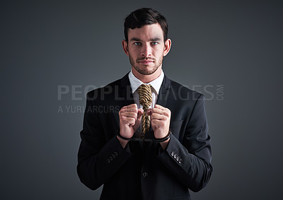 Buy stock photo Businessman, handcuffs and rope tie with corporate noose, finance debt and economy pressure. Model, hanging and cost crisis with financial bondage, failure and execution on gray studio background