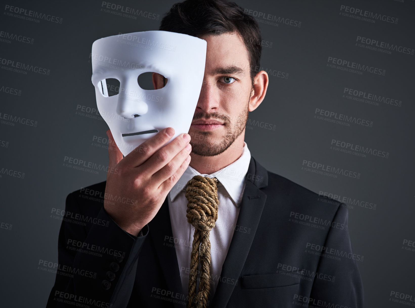 Buy stock photo Two faced portrait, mask and fake businessman in a studio with serious face with secret personality. Manager and corporate male with rope tie showing corporate slavery and control in business suit