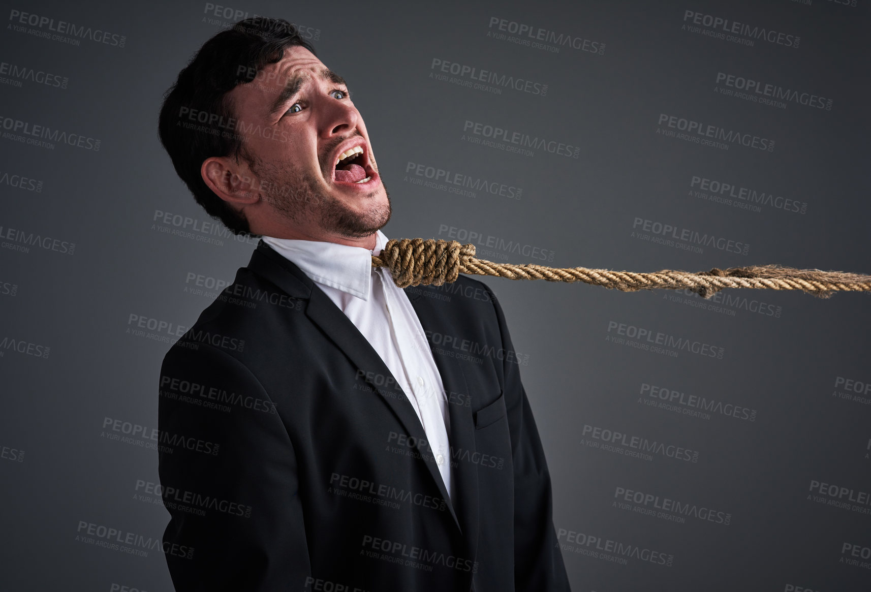 Buy stock photo Businessman, scream and noose tie with corporate stress, finance debt and economy pressure. Model, hanging and cost crisis with financial bondage, failure and execution on gray studio background