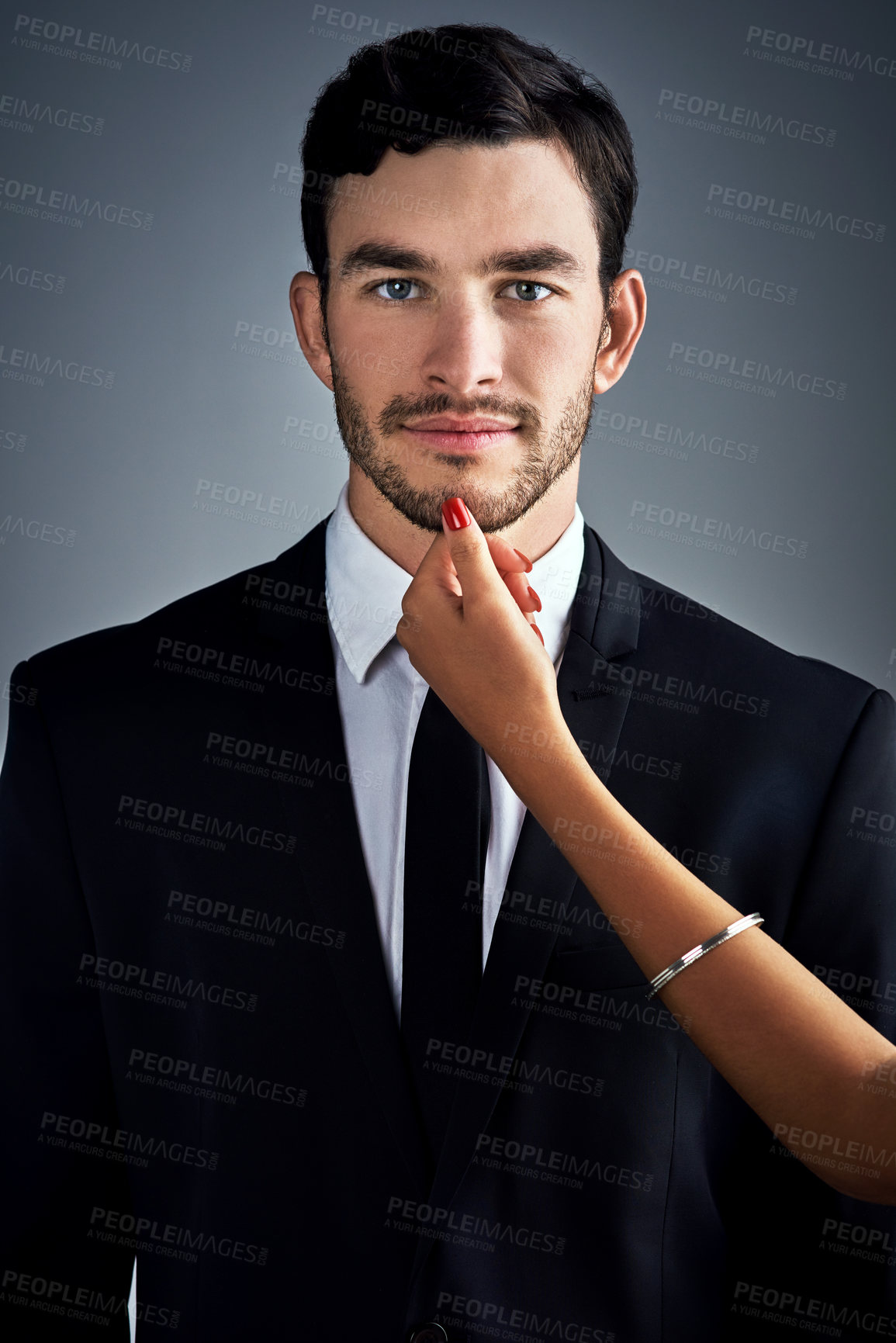 Buy stock photo Businessman, portrait and woman hand touch in studio, sensual flirting and mistress for romance. Male person, seduction and feeling fingers for professional infidelity, lust and gray background