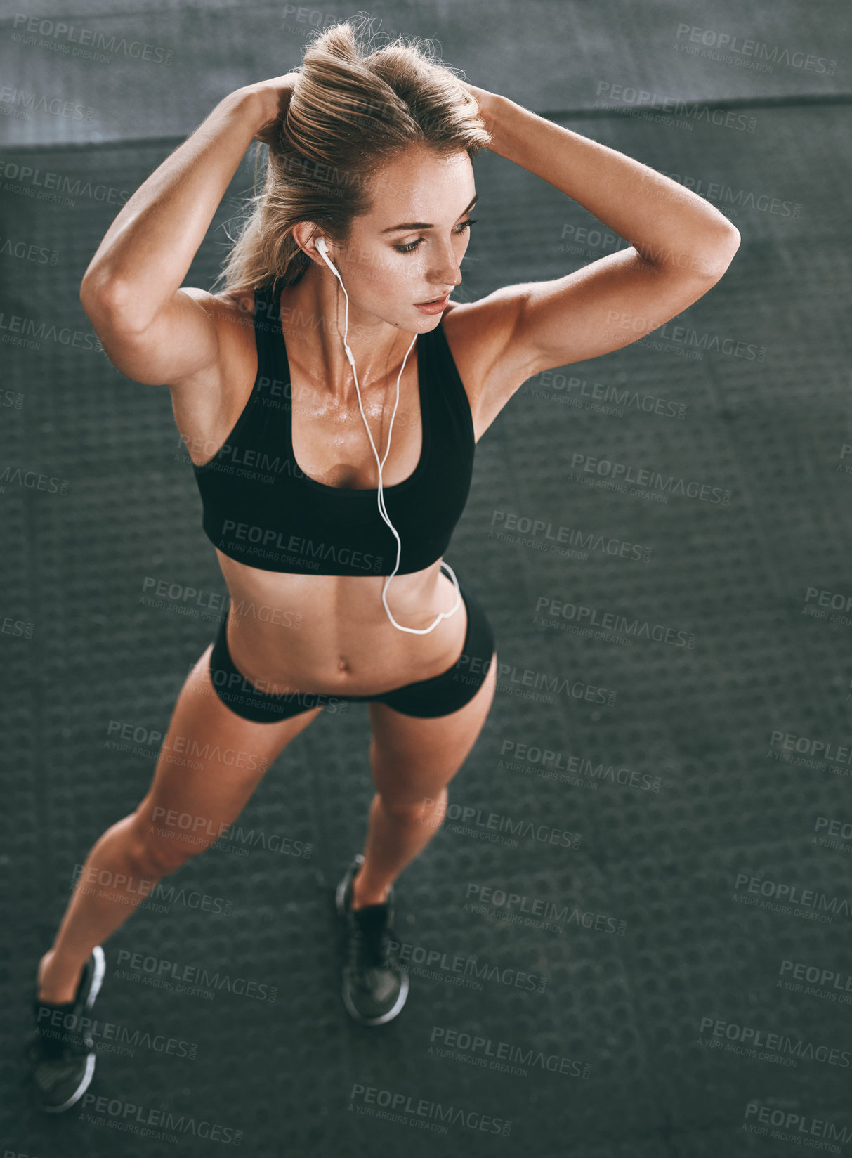 Buy stock photo Shot of a well-built woman posing in a gym