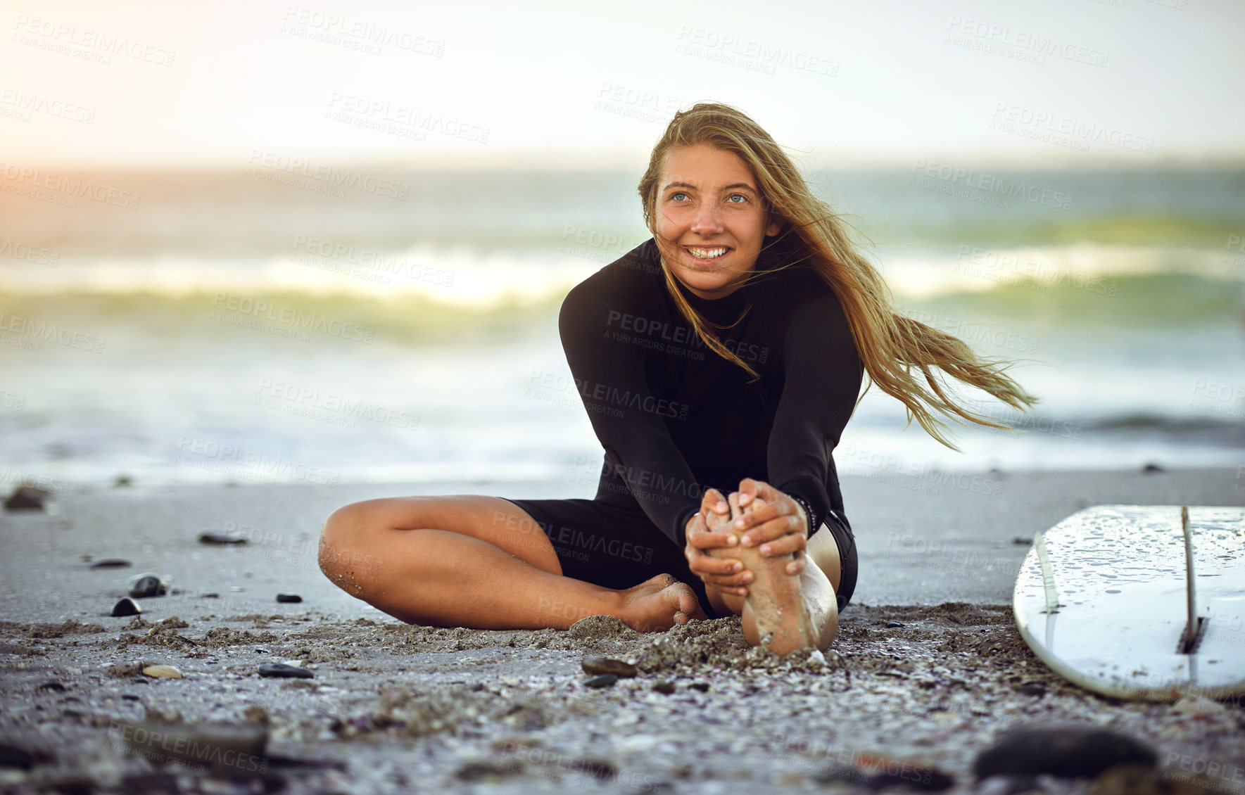 Buy stock photo Woman, surfboard and thinking at beach for stretching, outdoor adventure and fitness warm up. Surfer, leg exercise and ready at ocean for recreational activity, sport and summer vacation in morning