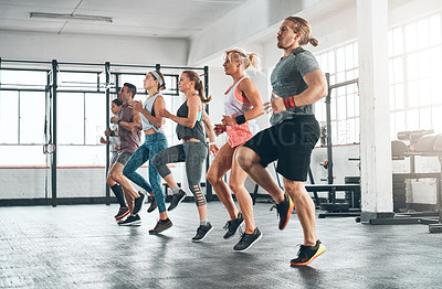 Buy stock photo Sports, people and group of athletes in gym for health, wellness and body workout. Team, warm up and personal trainer challenge with active routine for cardio exercise at class in fitness center