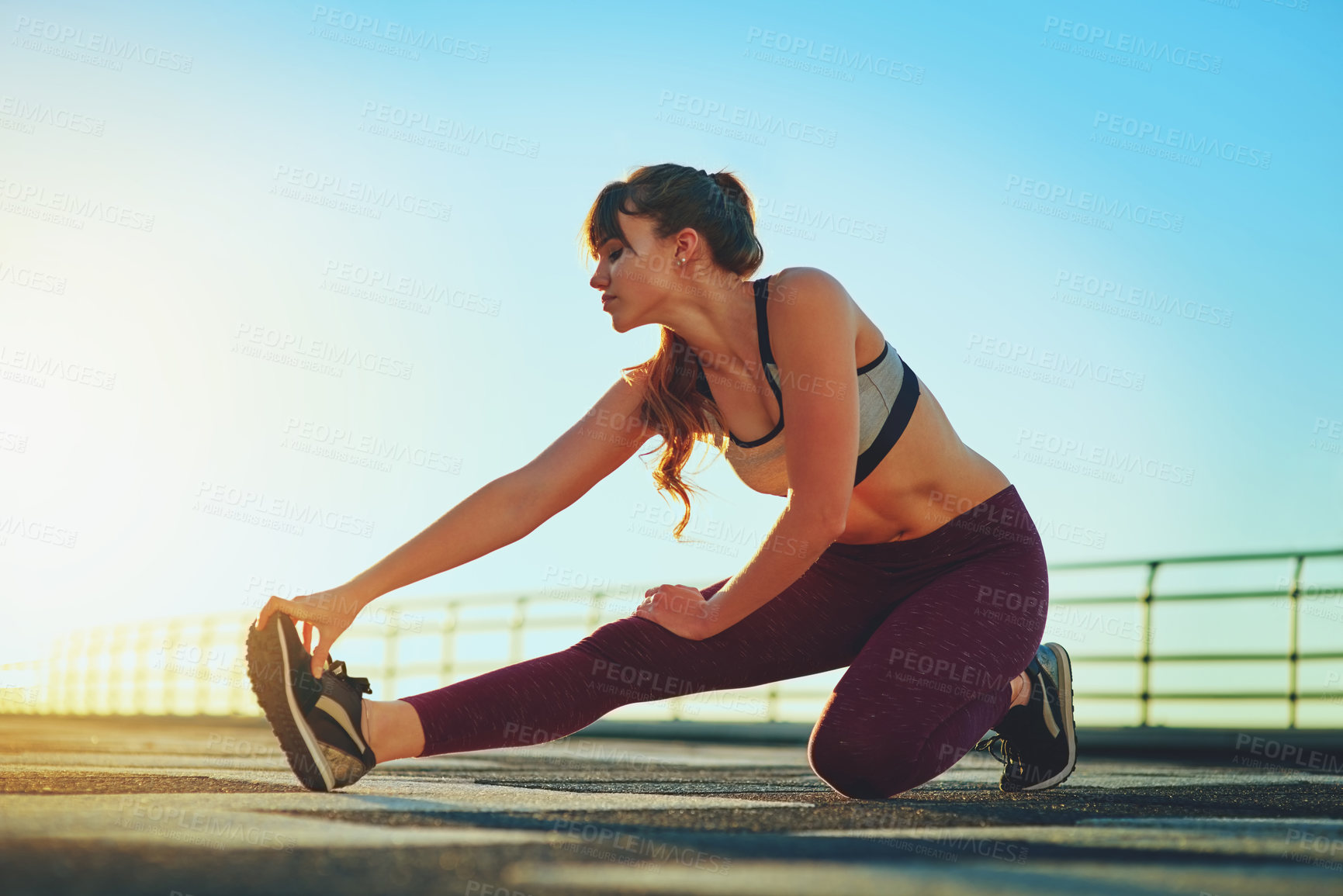 Buy stock photo Shot of a beautiful young woman out for her morning workout