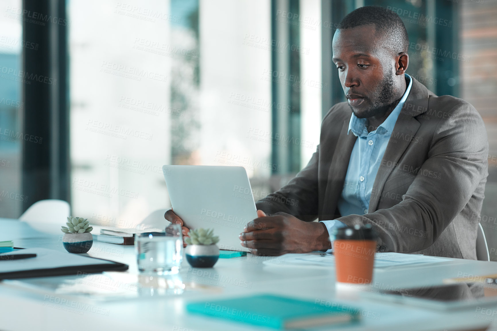 Buy stock photo Laptop, reading or black man in office for audit, planning tax return or online reimbursement site. Review records, budget  or accountant with digital transactions statement, monitor cash flow or pc