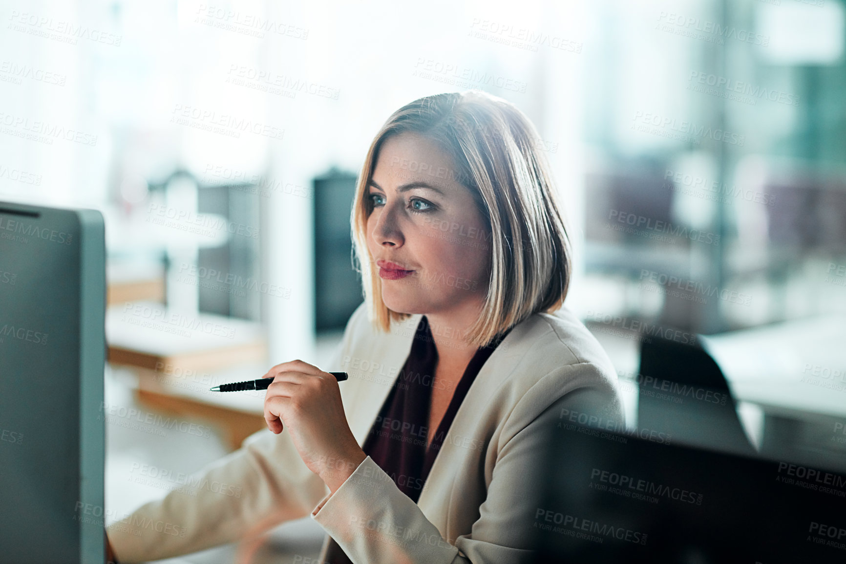 Buy stock photo Businesswoman, thinking and reading on computer for research, information and pen in office. Female lawyer, idea and review details on internet for consulting, legal advice and strategy for case