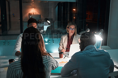 Buy stock photo Graph, night and teamwork with laptop in office, meeting and deadline for project and planning. Collaboration, online and business people, proposal and computer for financial records in boardroom