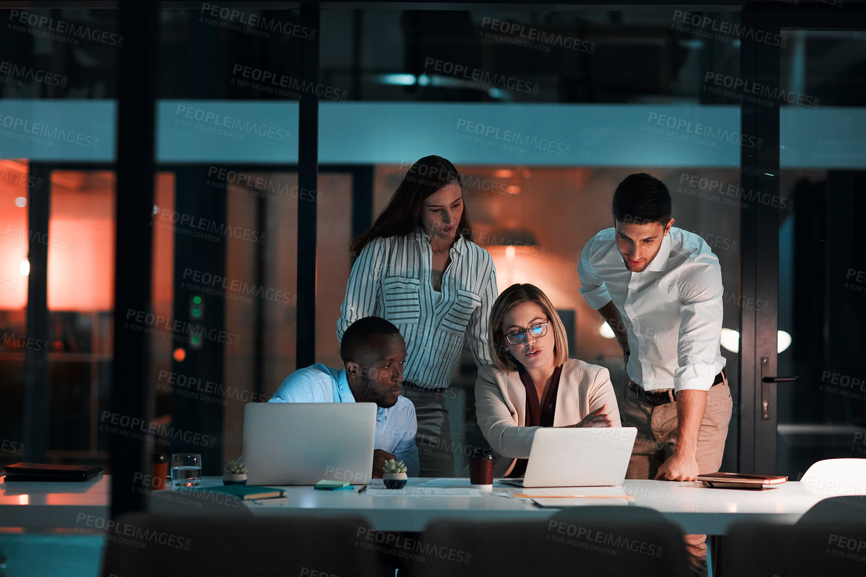 Buy stock photo Conversation, laptop and business people in office at night with stock market charts for corporate investment. Discussion, computer and financial advisors work on company profit report with deadline.