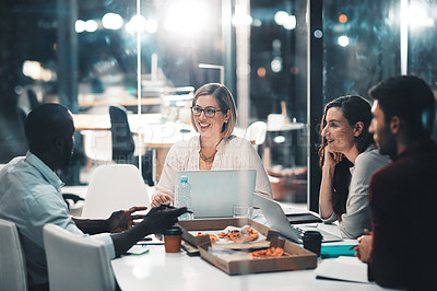 Buy stock photo Workshop, late night and marketing team in discussion at meeting with laptop and food at startup. Teamwork, overtime and diversity, business people brainstorming project at creative marketing agency.