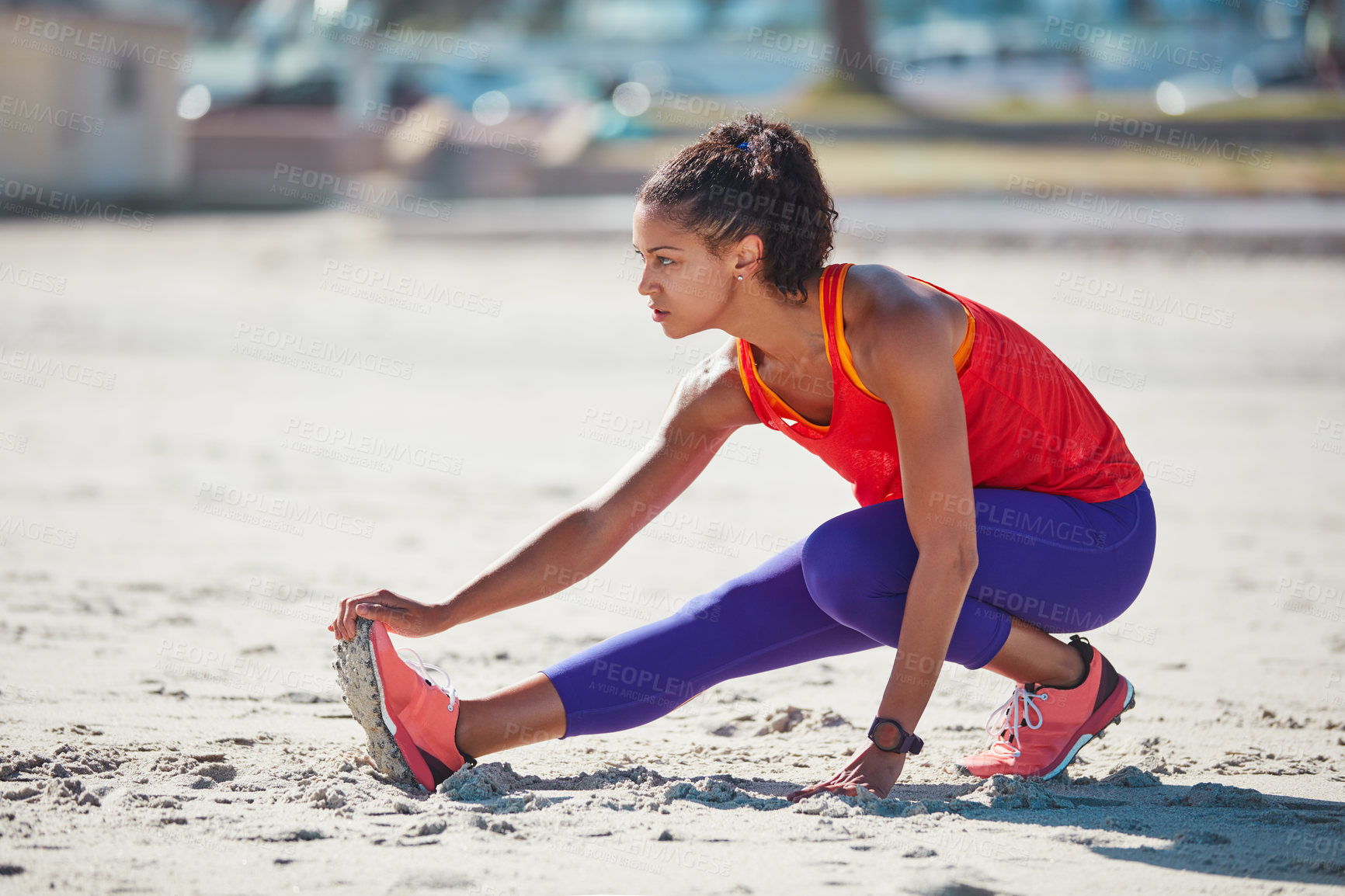 Buy stock photo Woman, fitness and stretching with foot on beach sand for workout preparation, exercise or training. Active, female person or outdoor runner getting ready with leg warm up for health and wellness
