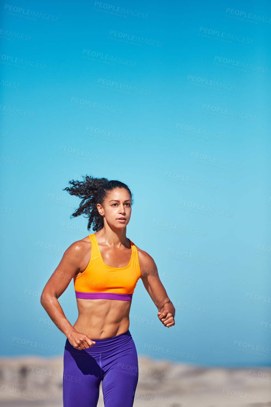 Buy stock photo Running, fitness and woman with wellness, confidence and cardio workout for health benefits. Outdoor, person or runner with exercise, training or practice with blue sky, athlete or endurance in Miami