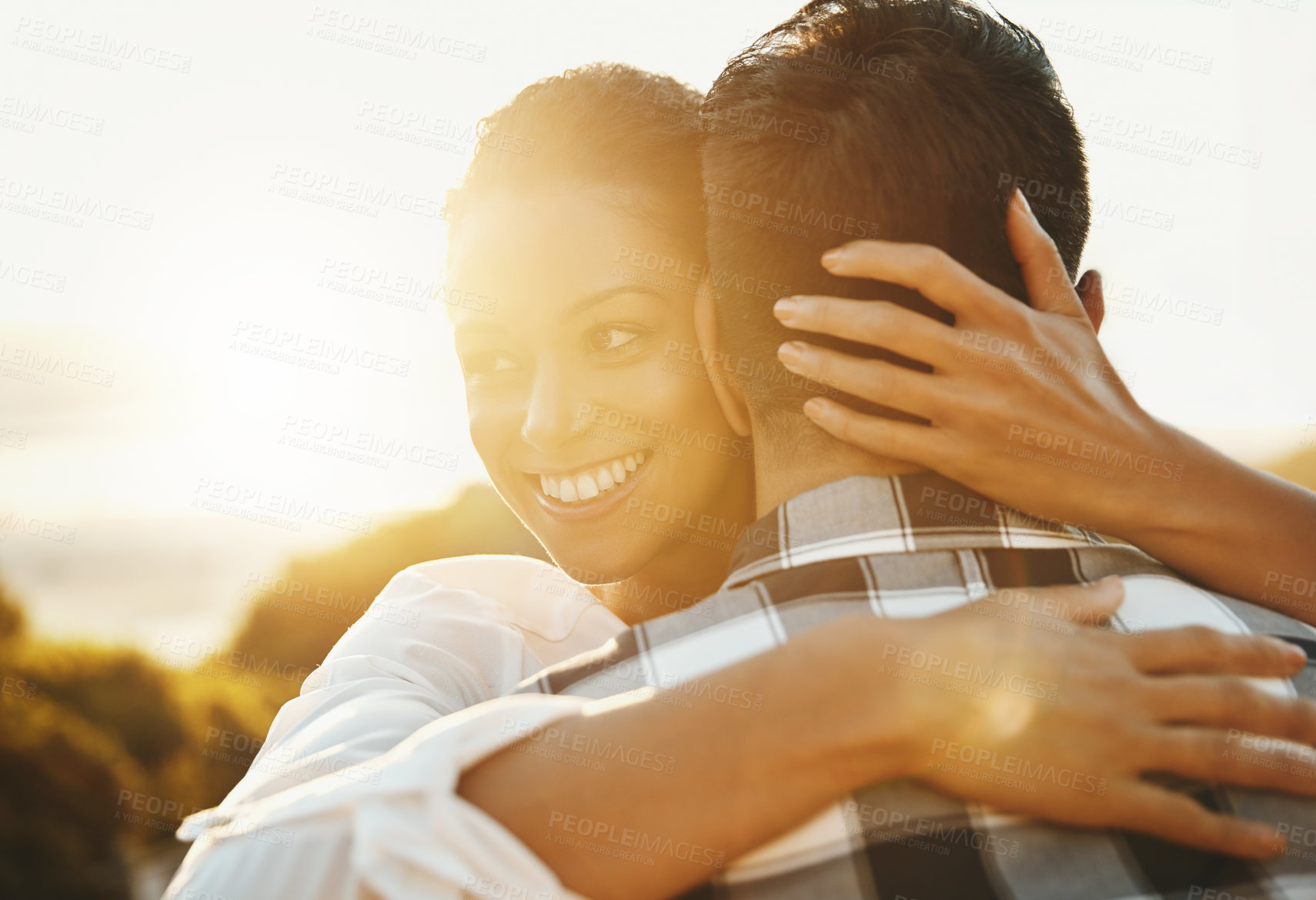 Buy stock photo Cropped shot of a loving couple  spending the day on the beach