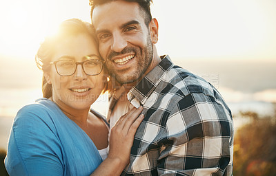 Buy stock photo Cropped shot of a loving couple  spending the day on the beach